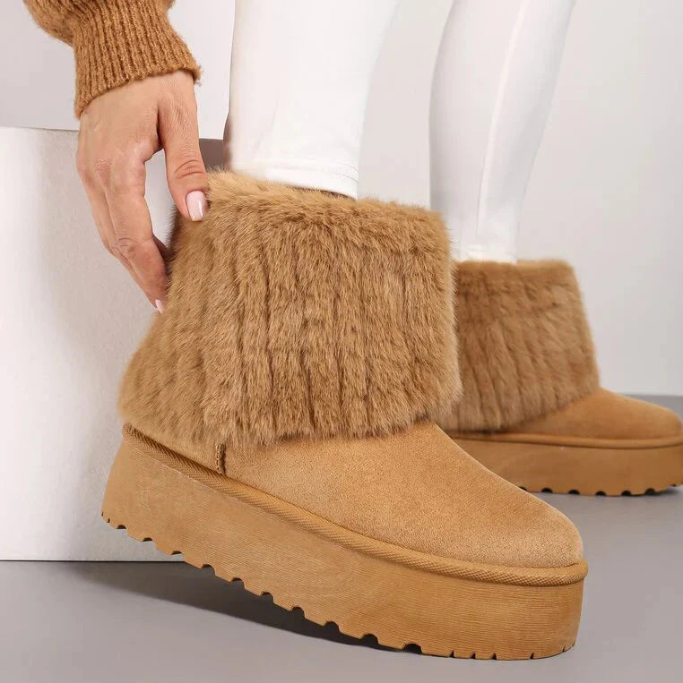 UGG fourrées compensées à rabat en fourrure