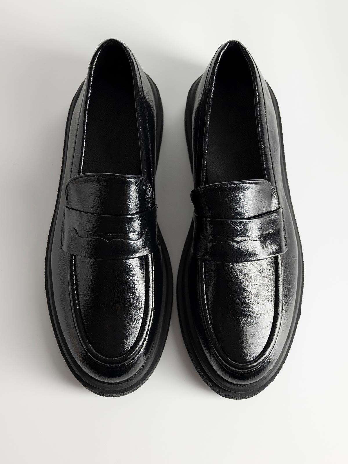 Mocassins à double talon avec bande décorative