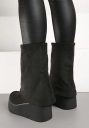 Bottines en daim à revers et talon compensé
