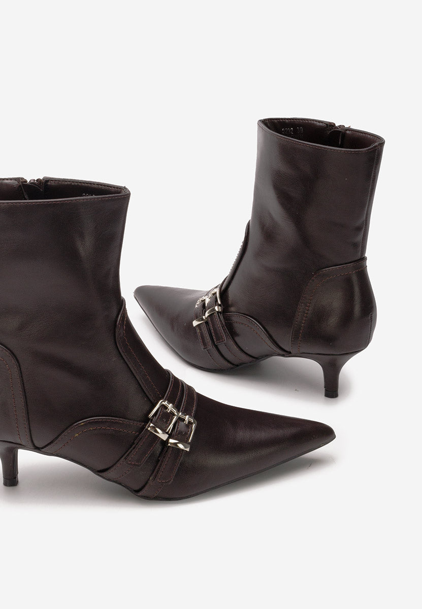 Demi bottes à talons aiguilles avec bouts pointus et boucles