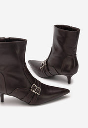 Demi bottes à talons aiguilles avec bouts pointus et boucles