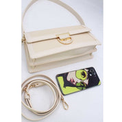 Sac à main élégant en tissu brodé et cuir