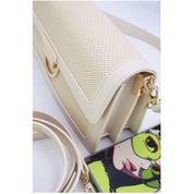 Sac à main élégant en tissu brodé et cuir