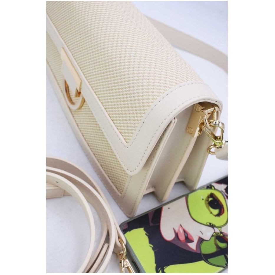 Sac à main élégant en tissu brodé et cuir