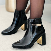 Demi botte en synthétique avec bride métallique doré