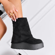 Bottines en daim à revers et talon compensé