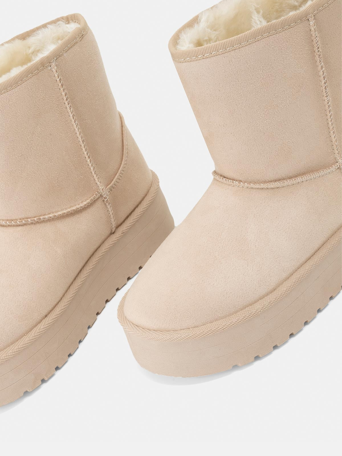 UGG en daim avec fourrure