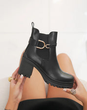 Demi bottes à talon moyen et boucle dorée