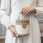 Sac bandoulière cylindrique à bijoux en cuir