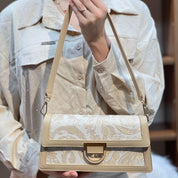 Sac à main élégant en tissu brodé et cuir