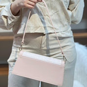 Sac à main élégant en tissu brodé et cuir