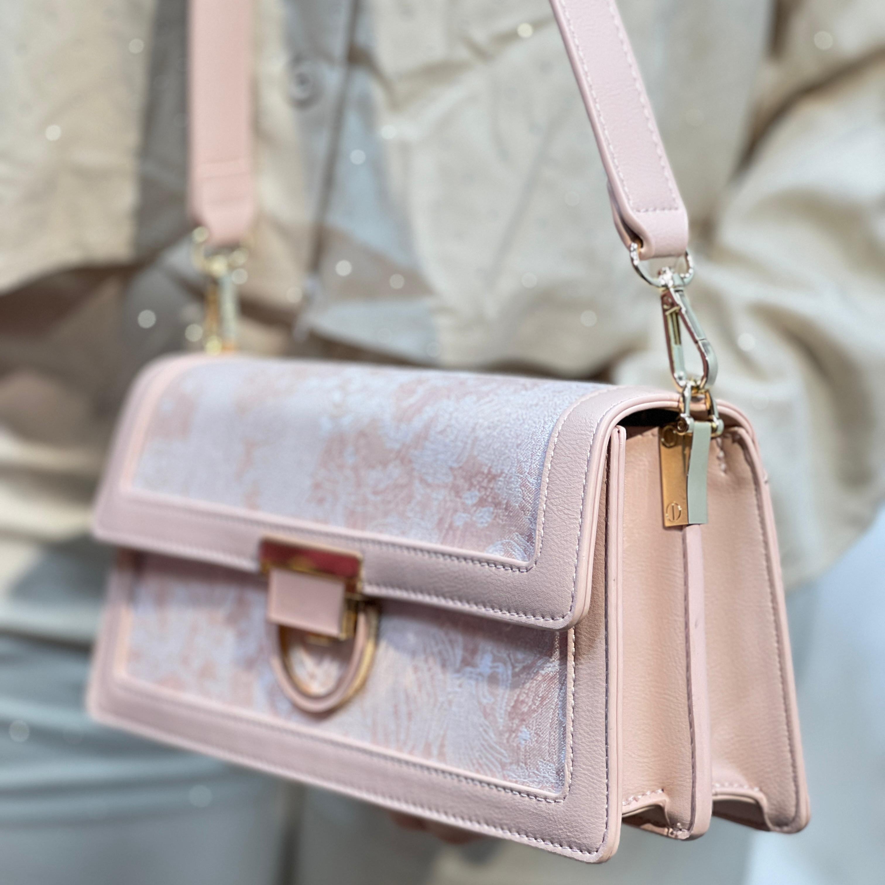 Sac à main élégant en tissu brodé et cuir