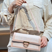 Sac à main élégant en tissu brodé et cuir