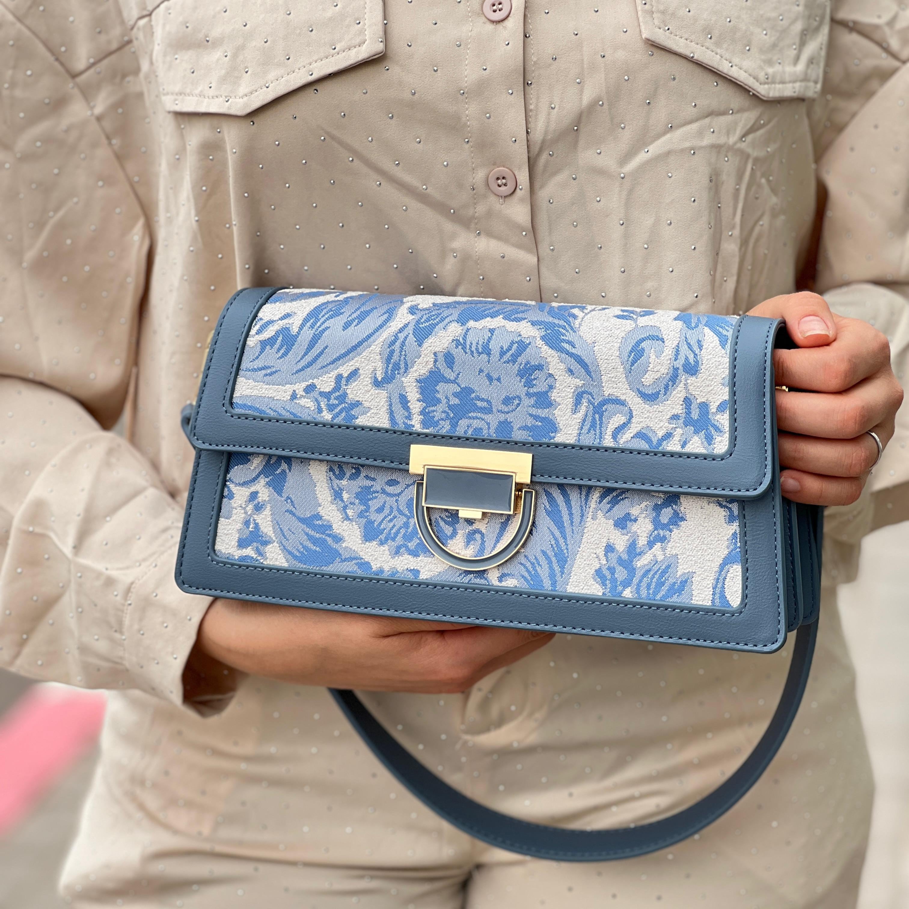 Sac à main élégant en tissu brodé et cuir