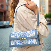 Sac à main élégant en tissu brodé et cuir