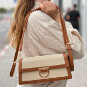 Sac à main élégant en tissu brodé et cuir