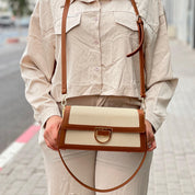 Sac à main élégant en tissu brodé et cuir