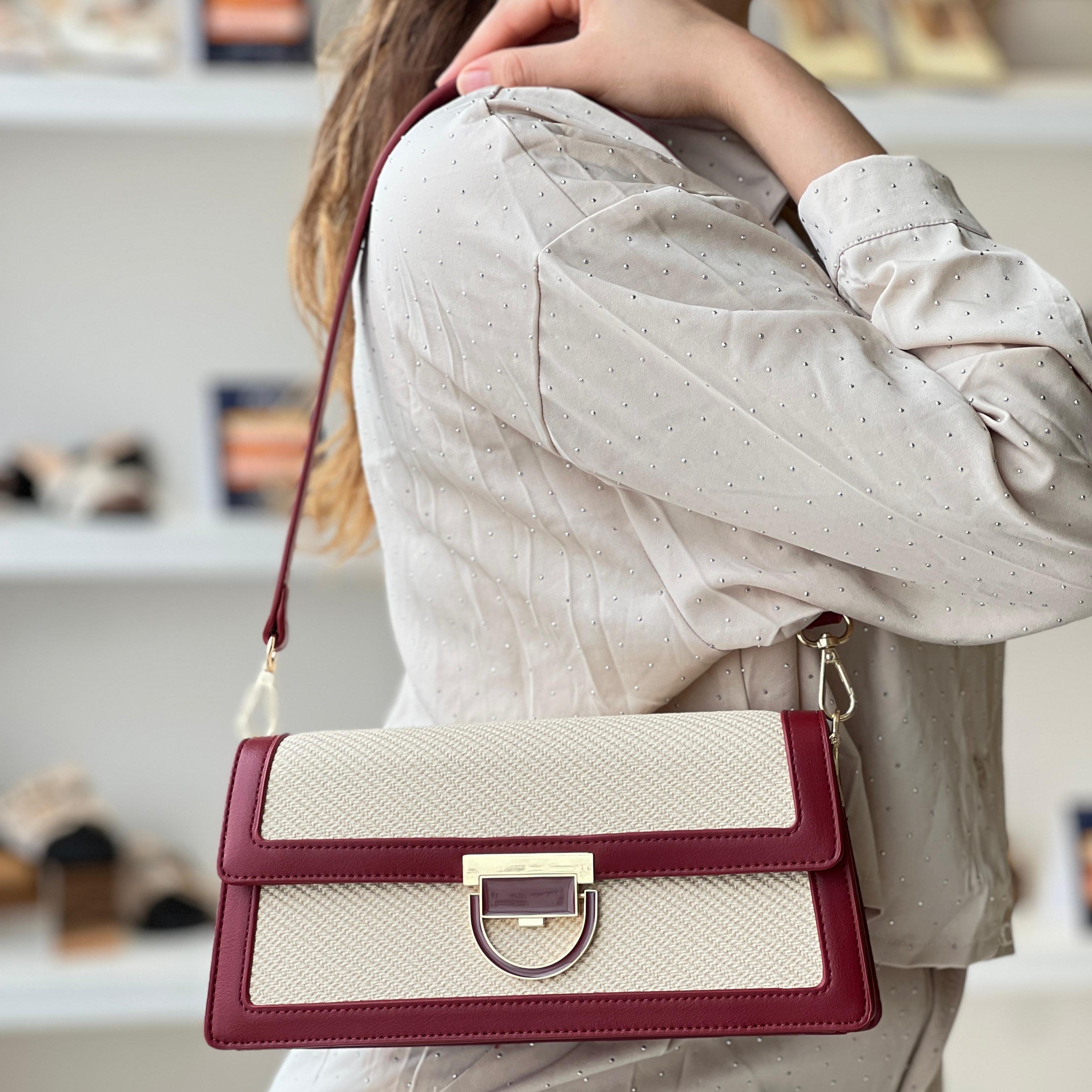 Sac à main élégant en tissu brodé et cuir