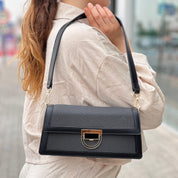 Sac à main élégant en tissu brodé et cuir