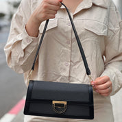 Sac à main élégant en tissu brodé et cuir