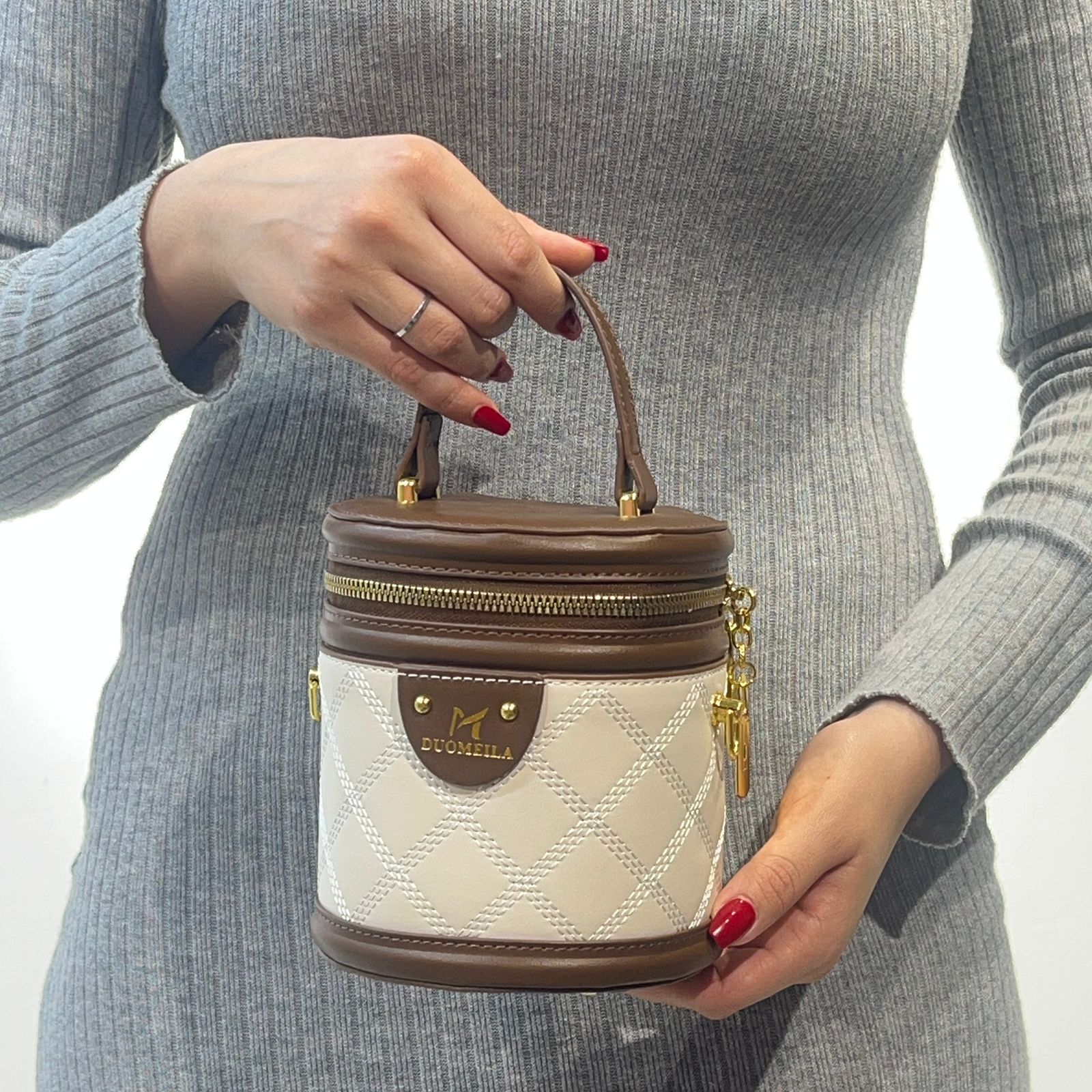 Sac bandoulière cylindrique à bijoux en cuir