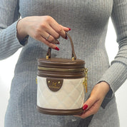 Sac bandoulière cylindrique à bijoux en cuir
