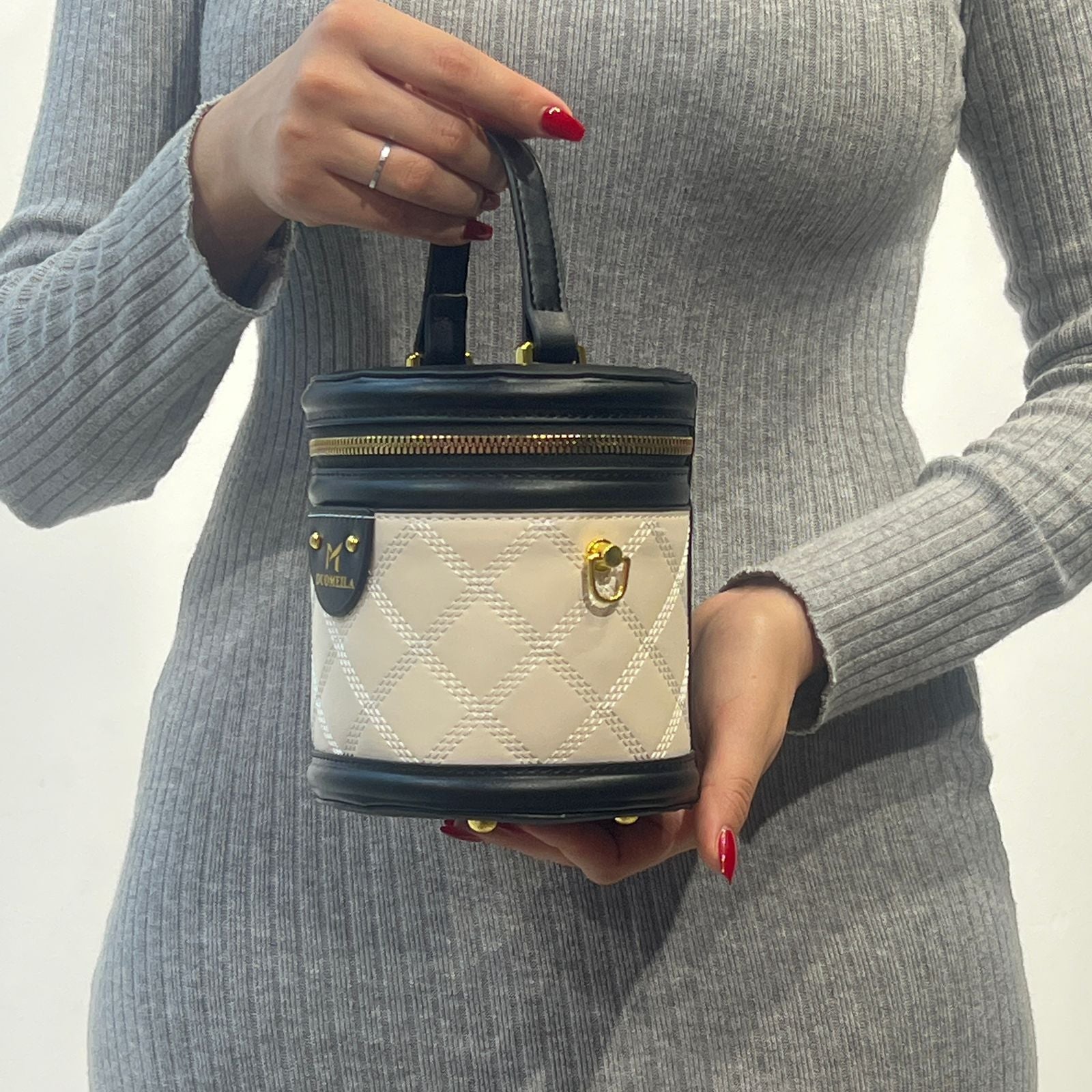 Sac bandoulière cylindrique à bijoux en cuir