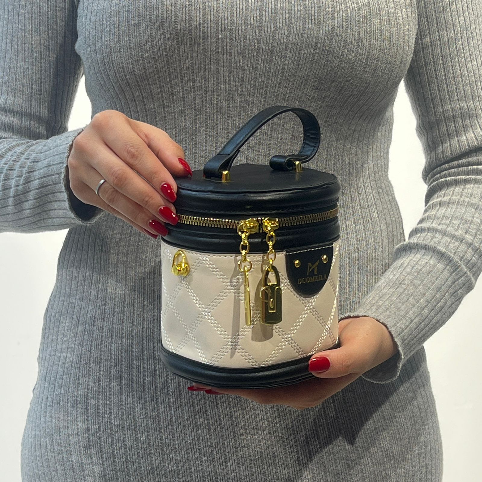 Sac bandoulière cylindrique à bijoux en cuir