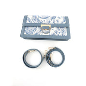 Sac à main élégant en tissu brodé et cuir