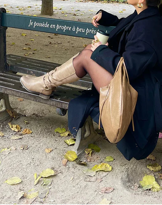 Botteshautes avec lanière et boucle détails en daim