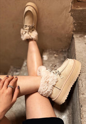 UGG à plateforme avec fourrure