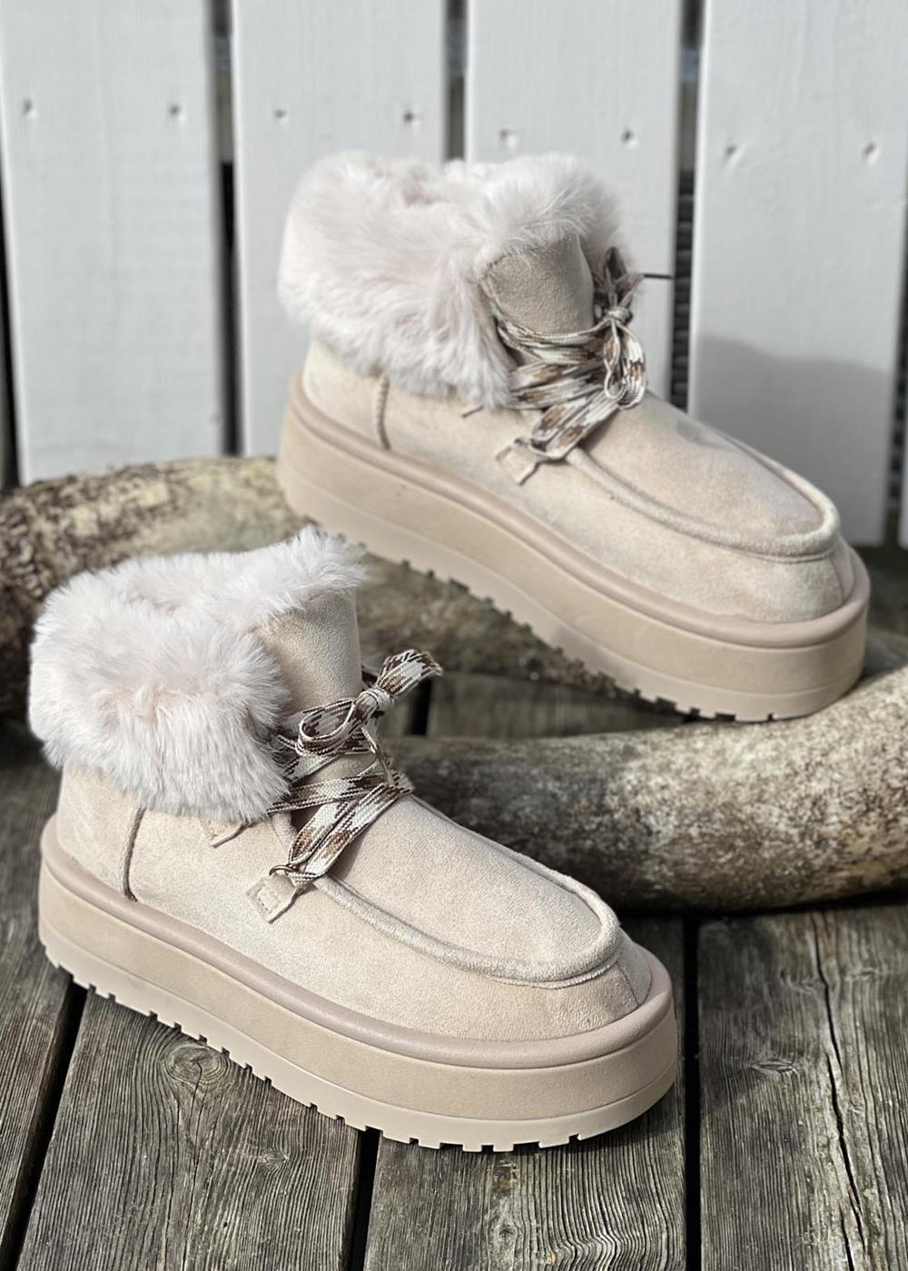 UGG à plateforme avec fourrure